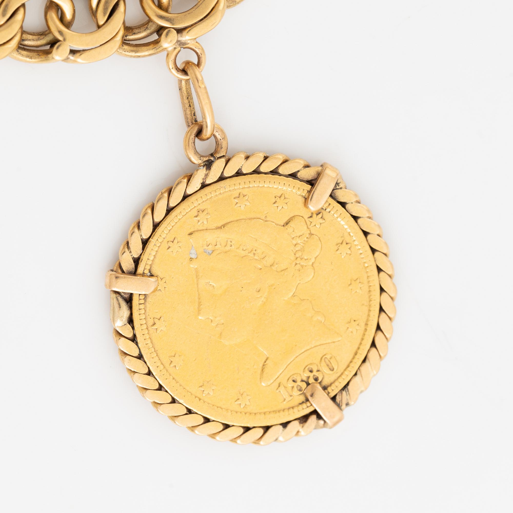 Armband guld bismarcklänk med berlocker med guldmynt.