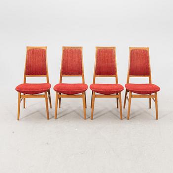 A set of four  mid 1900s teak chairs.
