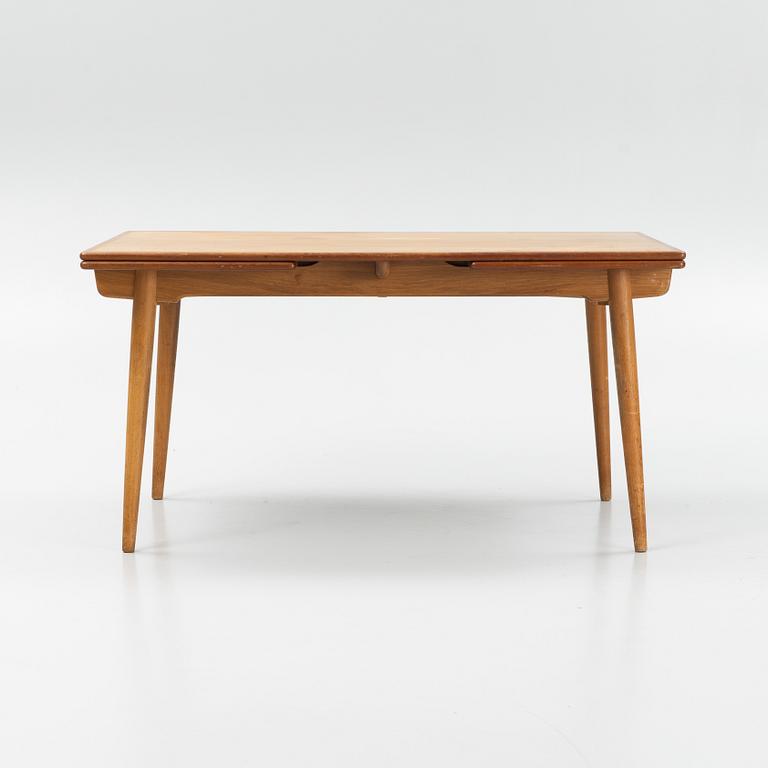 Hans J.Wegner, an 'AT-312' dining table, Andreas Tuck, Denmark.