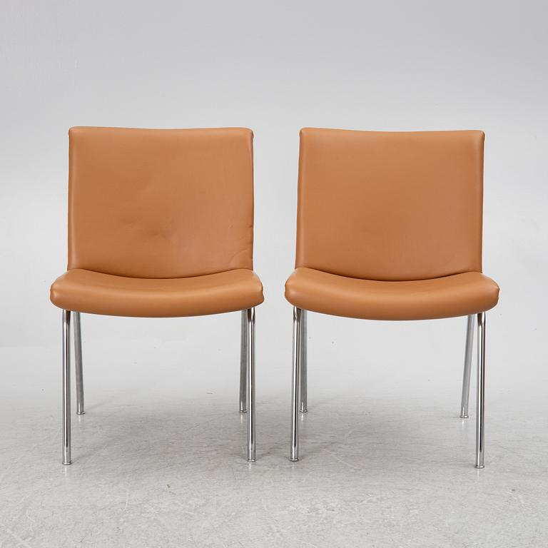 Hans J. Wegner, a pair pf "Kastrup Airport" lounge chairs, Denmark, late 20th century.