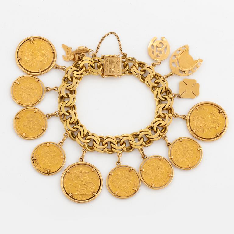 ARMBAND, 18K guld Bismarcklänk med berlocker och guldmynt.