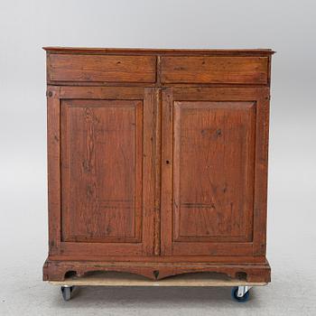 A 19th century cabinet.