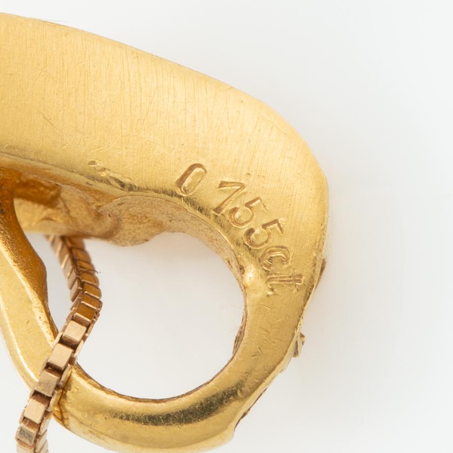 Pendant with chain, 18K gold set with brilliant-cut diamonds.