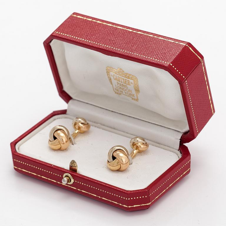 Cartier, A pair of 18K gold "Trinity" cufflinks. Marked Cartier M03073.