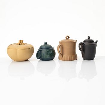 A group of three yixing teapots and a box with cover, China, 1970/80s.