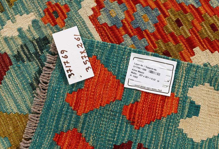 A Kilim carpet, c. 357 x 261 cm.