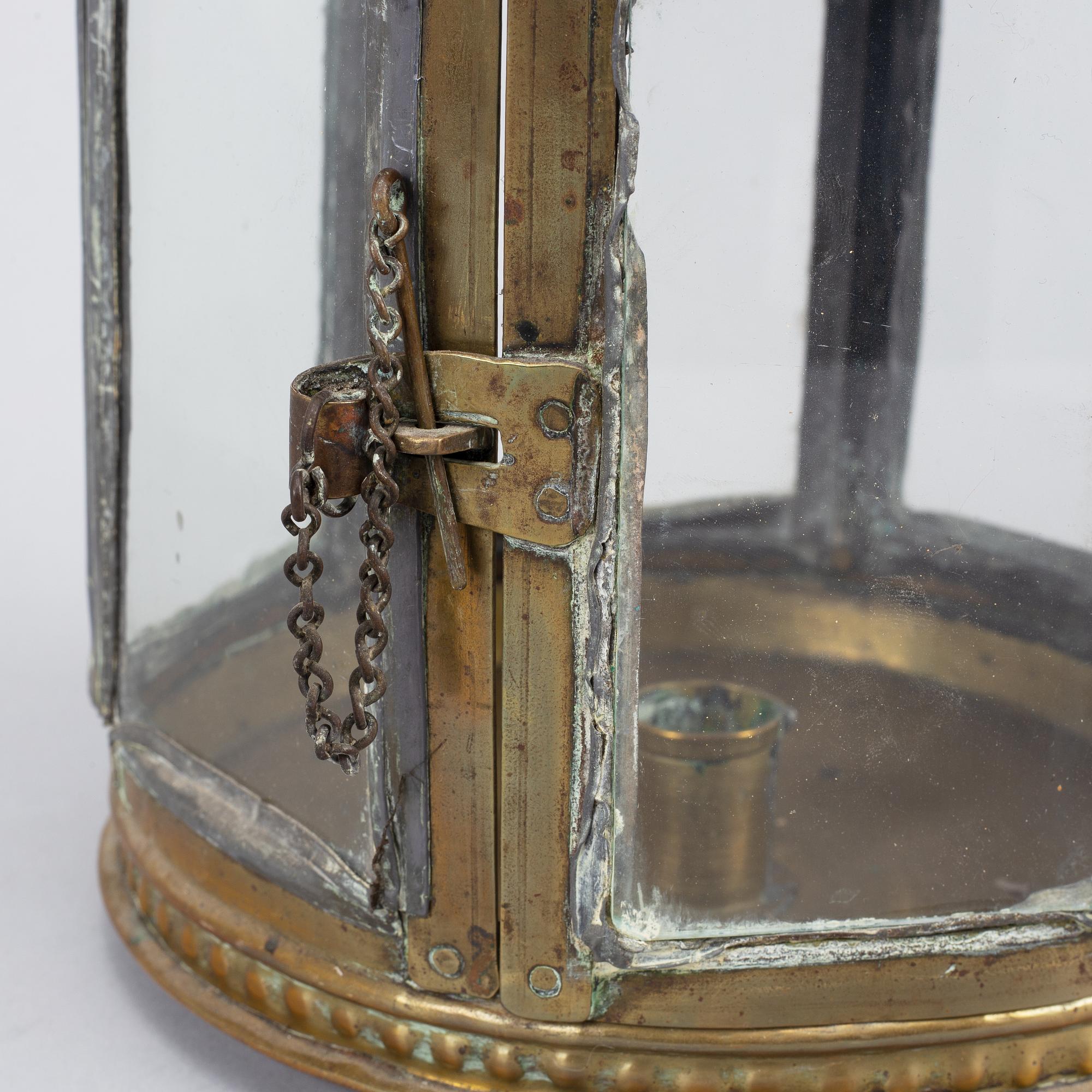 An 18th century brass lantern.