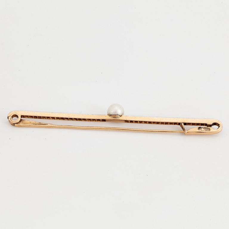 Cultured pearl and rose-cut diamond brooch.