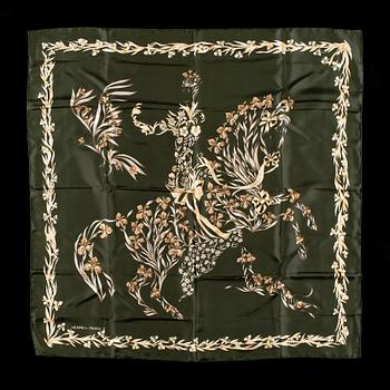 A silk scarf by Hermès,