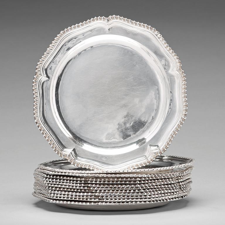 A set of twelve English 18th century silver dinner-plates, mark of Thomas Heming, London 1769.