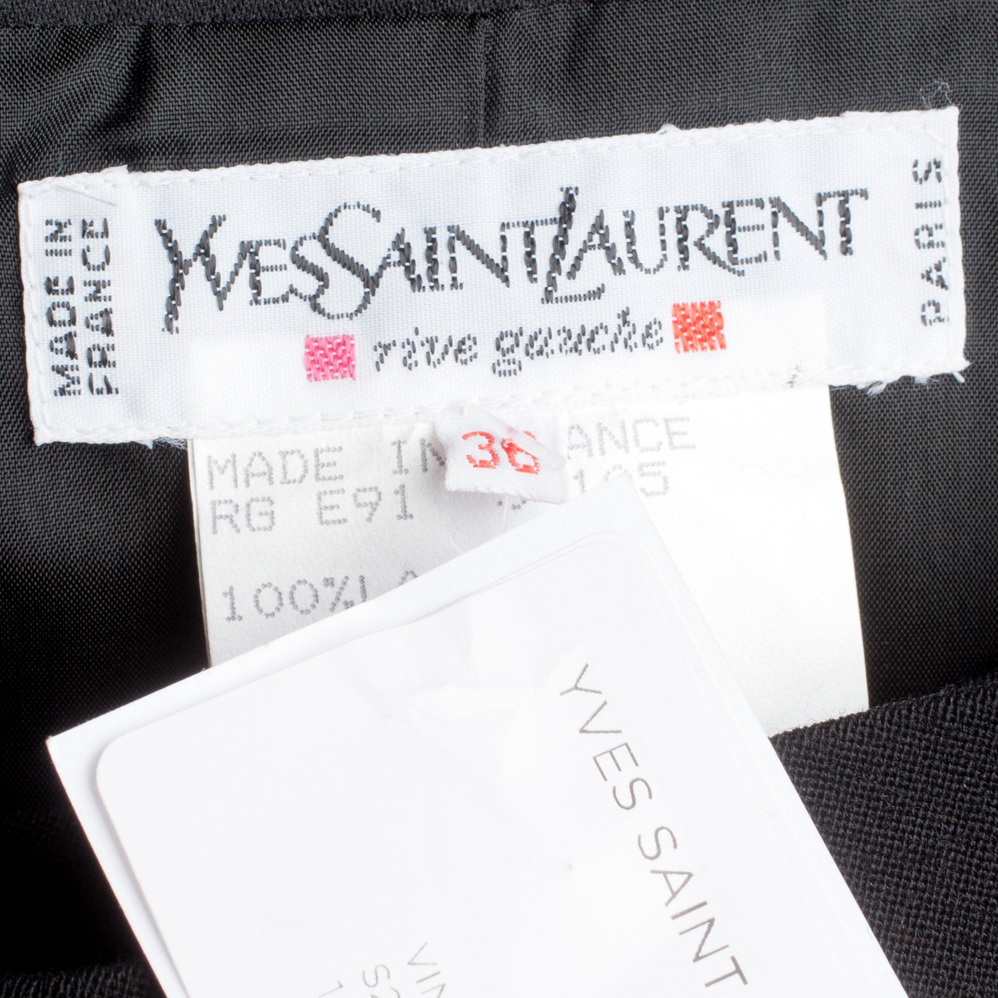 YVES SAINT LAURENT, a black wool dress.