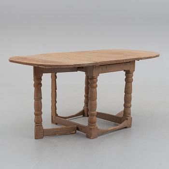 An 18th century Baroque gateleg table.