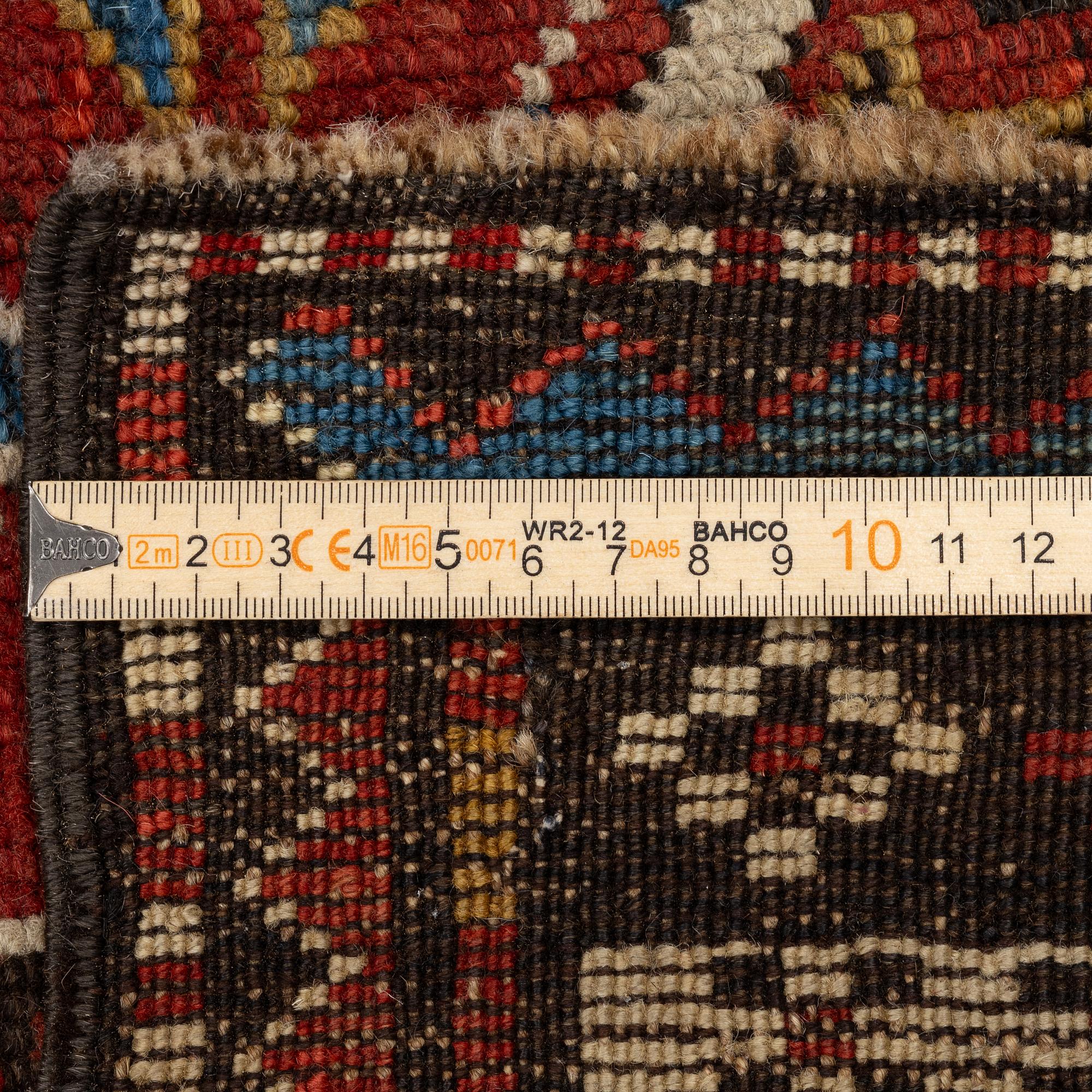 An antique Karabagh rug, south Caucasus, c. 210 x 118 cm.