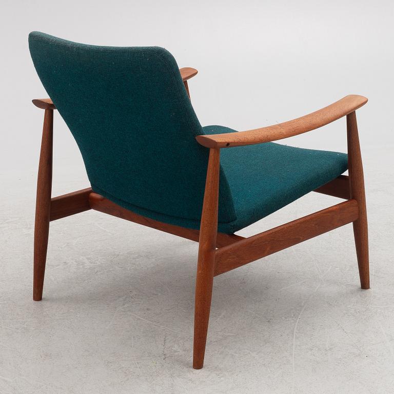 Finn Juhl, a model 138 armchair, France & Søn, Denmark, 1960s.