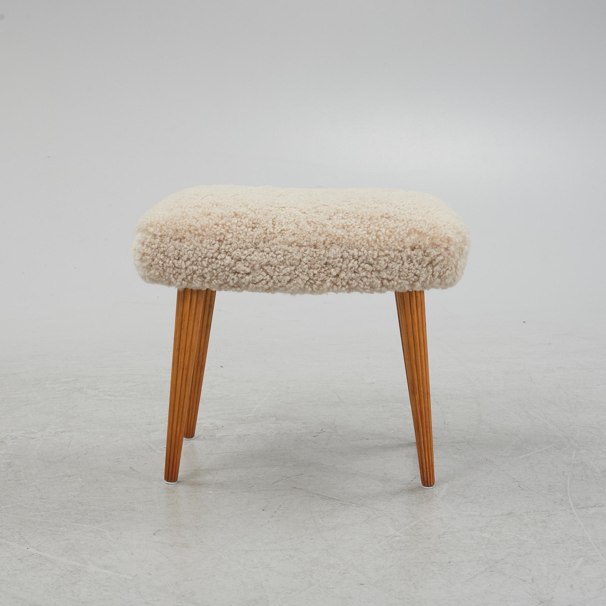A sheepskin upholstered stool, mid 20th Century.