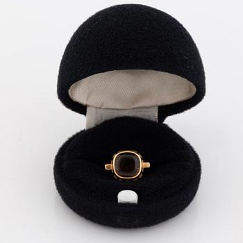 An 18K gold and smoke quartz Sigurd Persson ring.