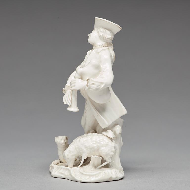 A Swedish Marieberg soft paste figure of a bag-piper, 18th Century.