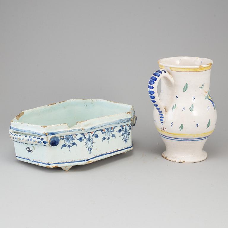 A fayence jug and jardiniere, 18th century.