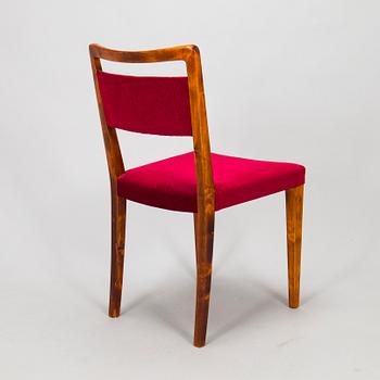 A mid 20th century dining table and a set of four chairs, Oy Boman Ab and two chairs Werner West.