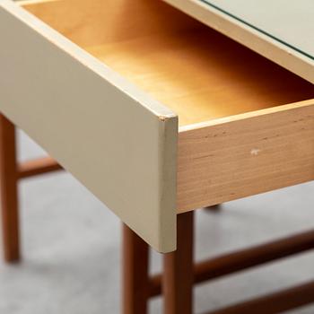 A pair of bedside tables, Nordiska Kompaniet, seconbd half of the 20th Century.