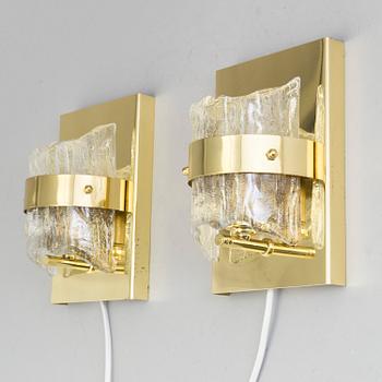 A pair of wall lights marked Fred L. Thiesen, 20th century.