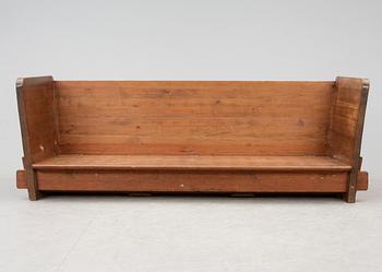 An Axel Einar Hjorth 'Lovö' stained pine sofa, Nordiska Kompaniet, Sweden 1930's.