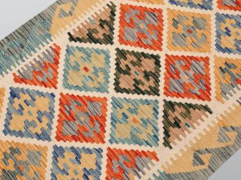 A Kilim rug, approx. 401 x 82 cm.