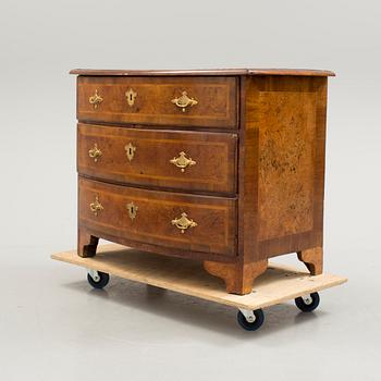 A 1700s chest of drawers.