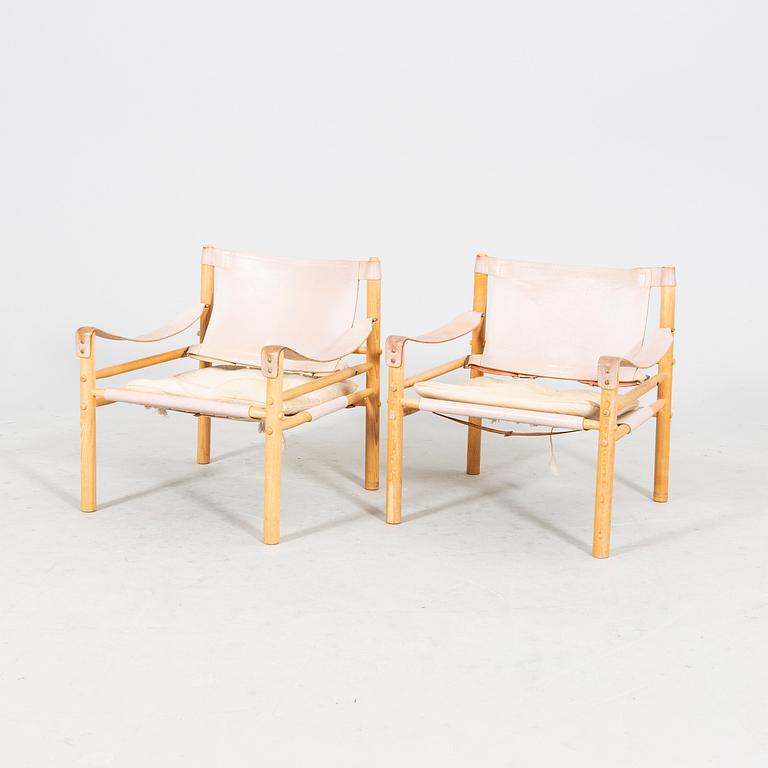 A pair of oak and leather 'Sirocco' easy chairs by Arne Norell for Norell Möbel AB, second half of the 20th century.