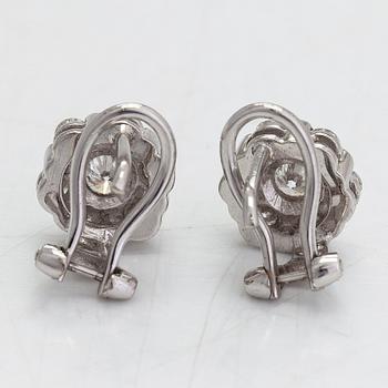 A pair of 18K white gold earrings, with diamonds totalling approximately 0.64 ct.