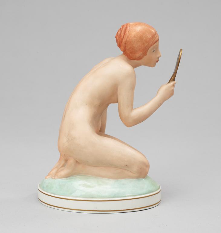 A Royal Copenhagen 20th century porcelain figure by Gerhard Henning.