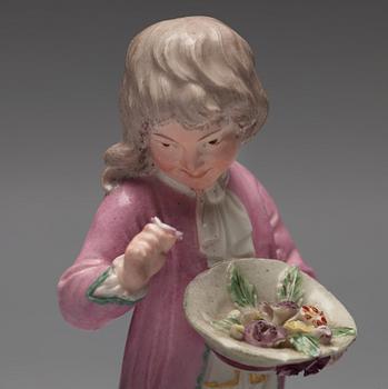 A Höchst porcelain figure of a boy, 1770's.