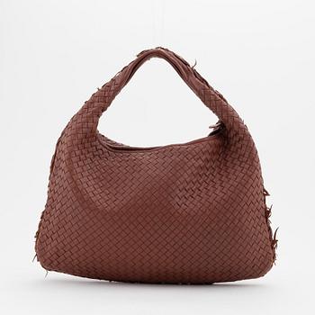 Bottega Veneta, an intrecciato leather hobo bag.