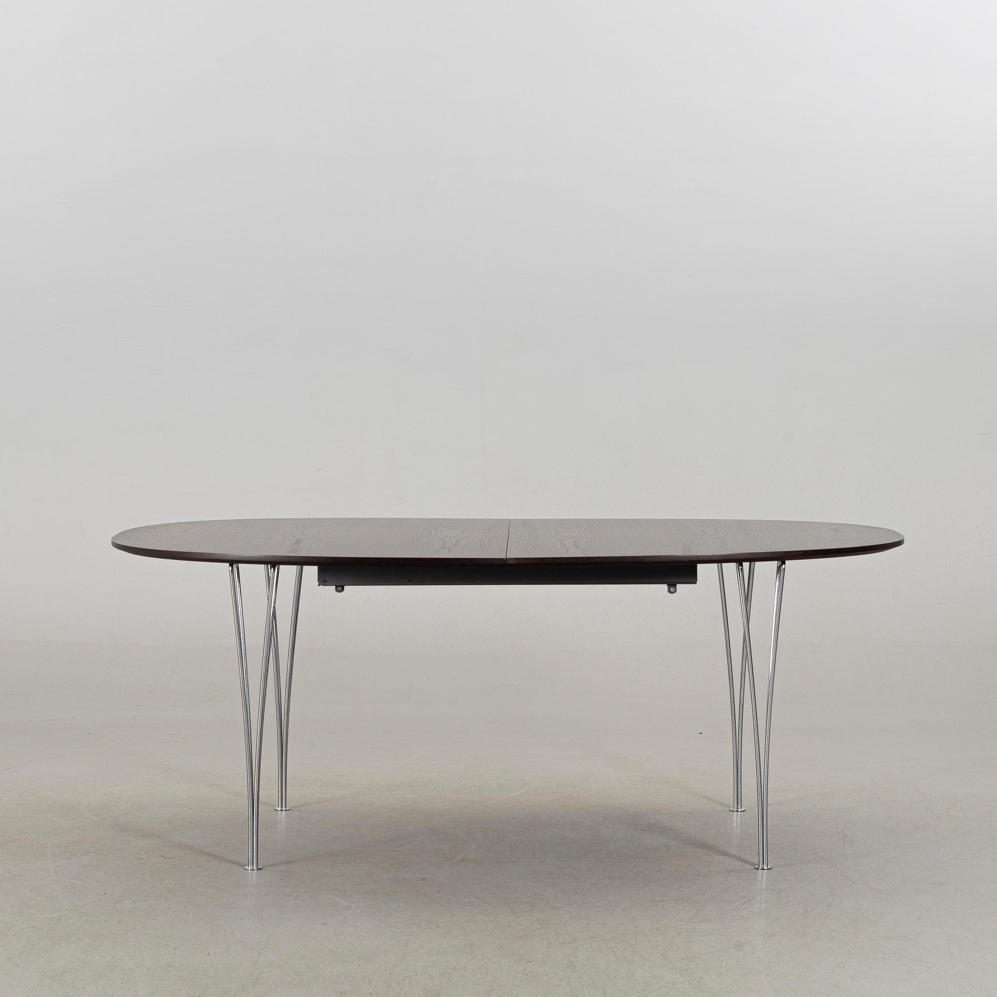 A SUPERELLIPS TABLE IN WENGE. BRUNO MATHSSON AND PIET HEIN for FRITZ HANSEN.