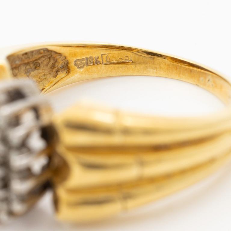 18K gold ring with diamonds.