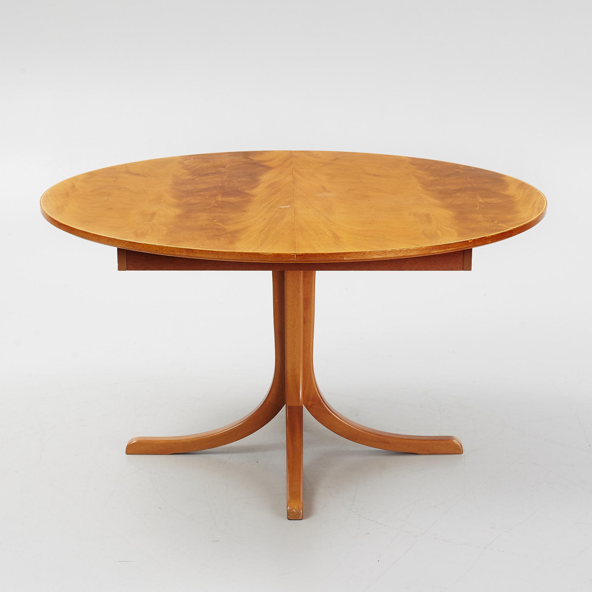 Josef Frank, a mahogany veneered model 771 dining table, Svenskt Tenn, post 1985.