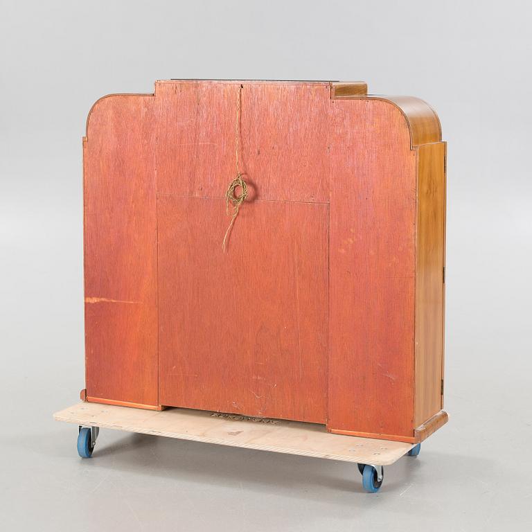 A 1960s "Mayfair" cocktail cabinet by Rivington, England.