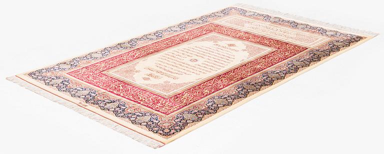 An extremely fine signed silk Qum rug, central Iran, c. 220 x 140 cm.