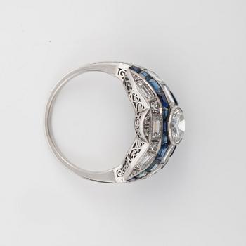 A sapphire and diamond ring. Centre stone circa 0.97 ct according to engraving.