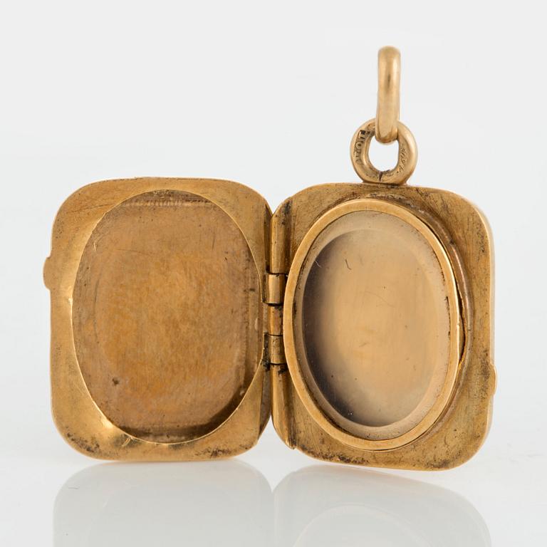 MEDALJONG, 18K guld och lapis lazuli.
