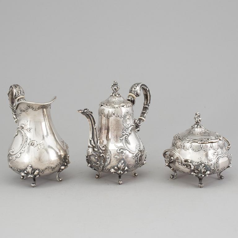 A SILVER COFFEEPOT, SUGARBOWL AND SIMILAR JUG, Hungary-Austria, ca 1900. Weight ca 1327 g.