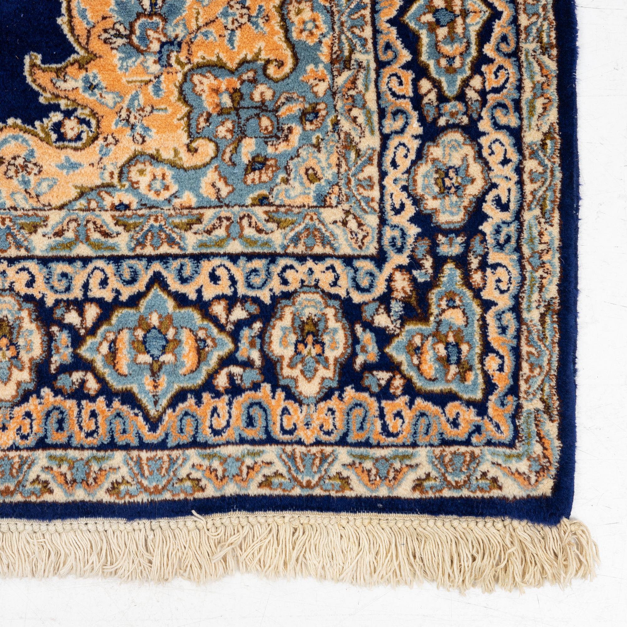 An old Kerman rug, ca. 249 x 148 cm.