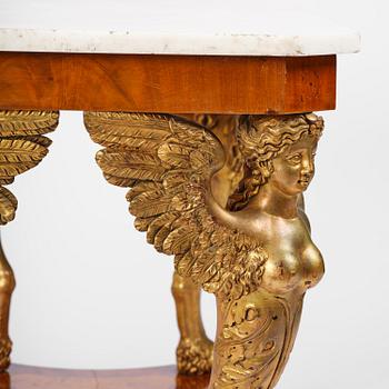 A presumably Austrian Empire centre table, early 19th century.