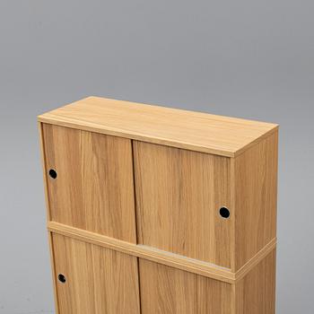NILS STRINNING, 3 oak 'String' cabinets.