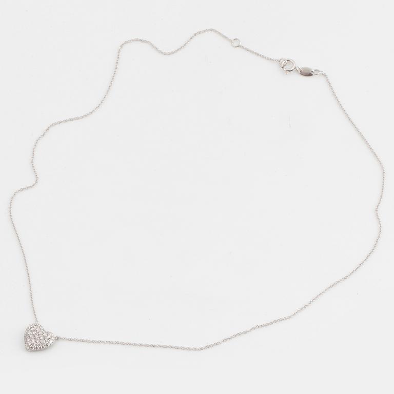 A heart shaped brilliant-cut diamond necklace.