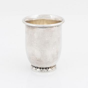 Georg Jensen, a sterling silver cup with holder, Denmark, post 1945.