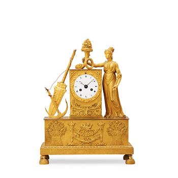556. A French Empire early 19th century mantel clock.