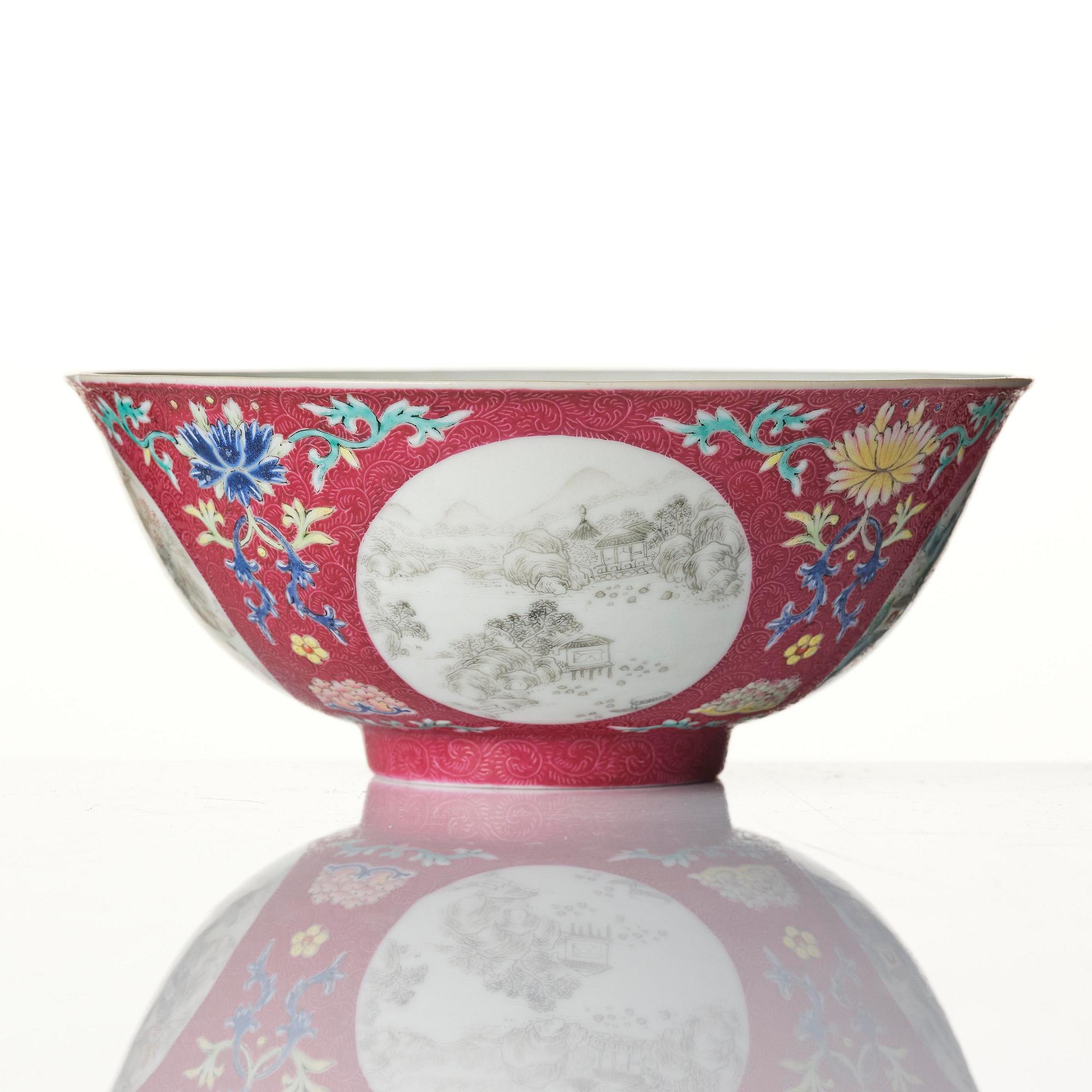 A famille rose ruby ground sgrafitto 'landscape' bowl, Qing dynasty, seal mark and period of Daoguang (1820-50).