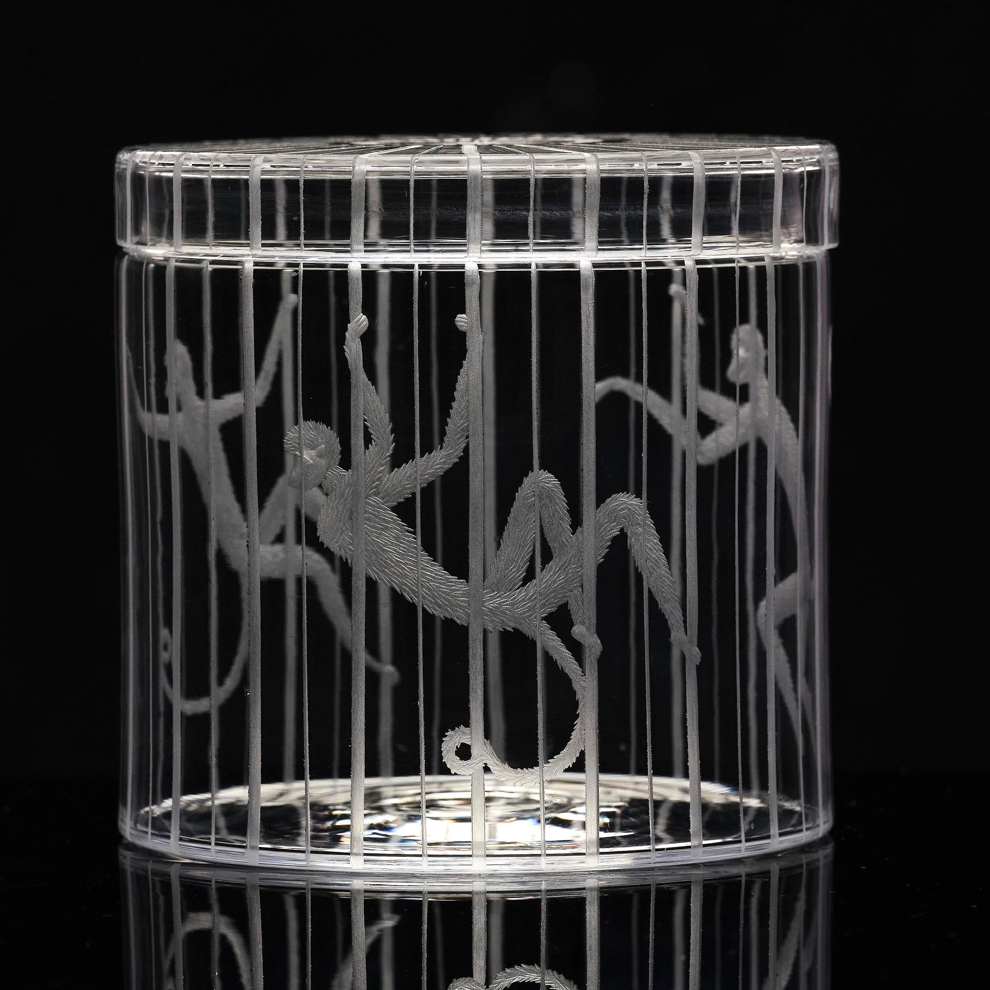 Edward Hald, an engraved lidded "Apburen" jar, Orrefors 1930.