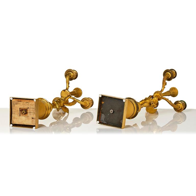 A pair of Empire ormula candelabras.